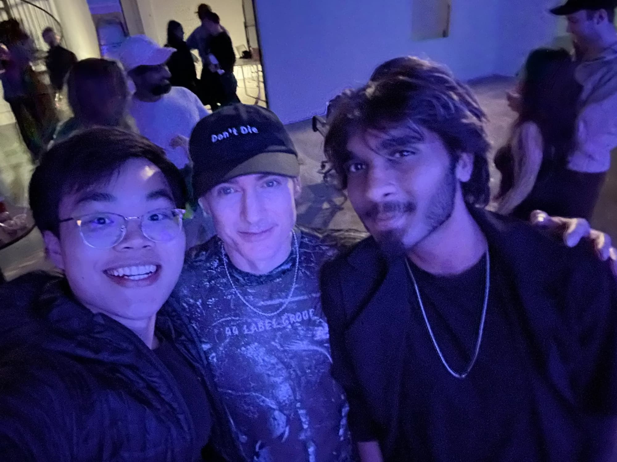 A group selfie with Bryan Johnson at an event.