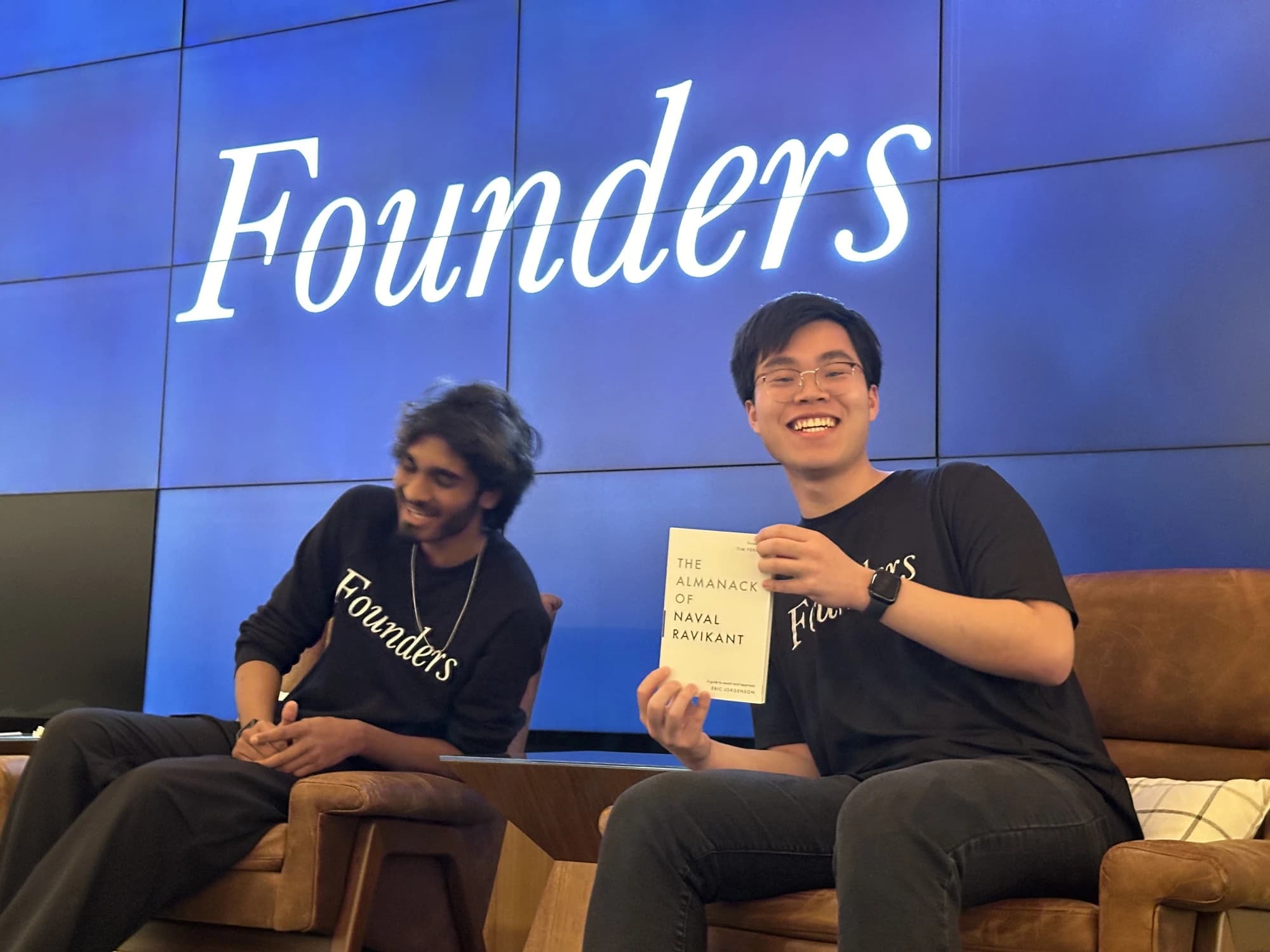 Mark and me seated onstage in front of a Founders backdrop.
